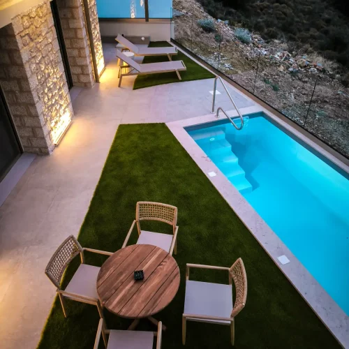 table and Pool at Anniko Suites Nafplio